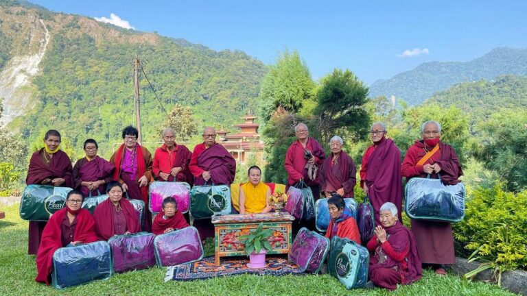 Offering gifts to the monks of Serzhong goenpa and nuns of Tashiphu Nunnery in Gelephu